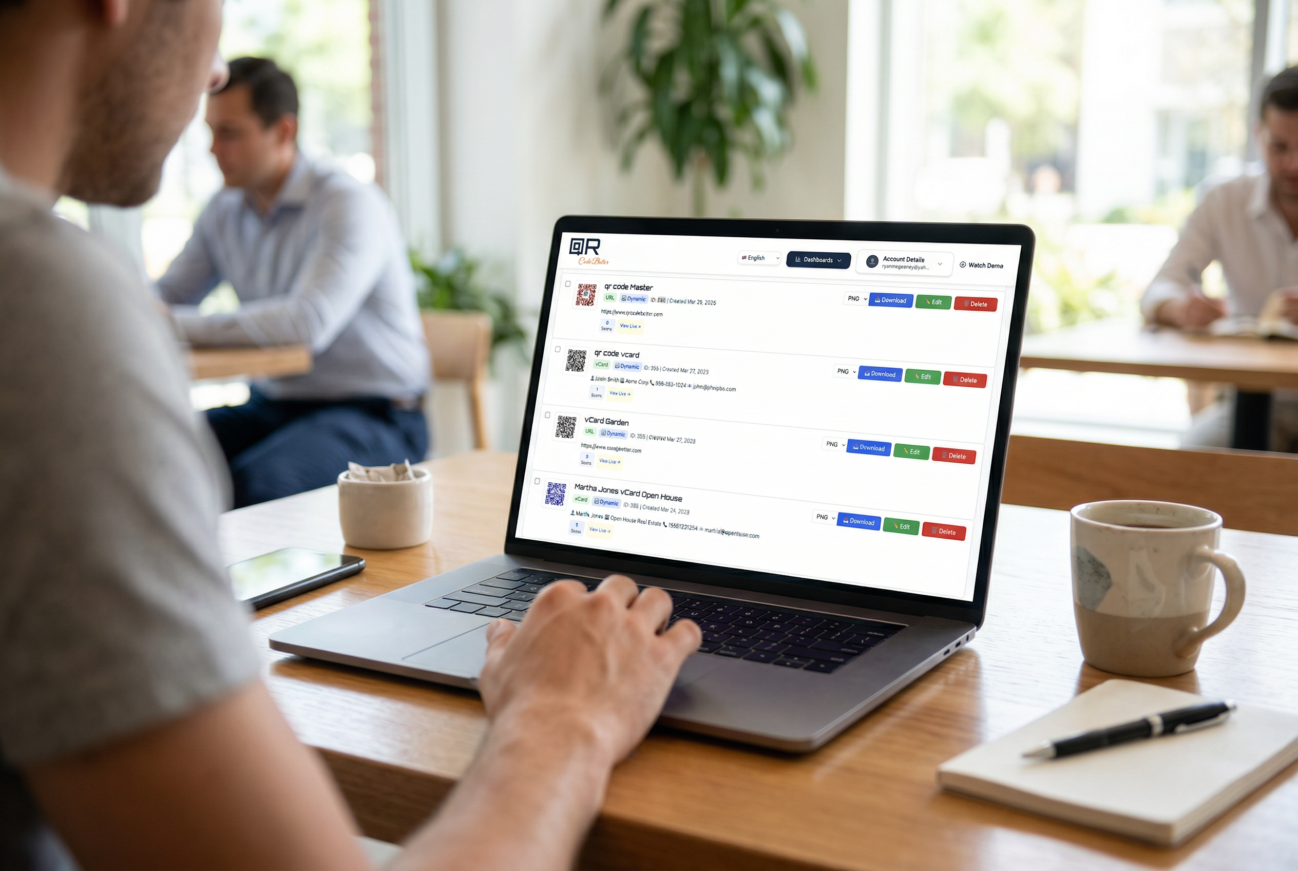 Person using QR Code Better to create a free QR code on a laptop at a desk